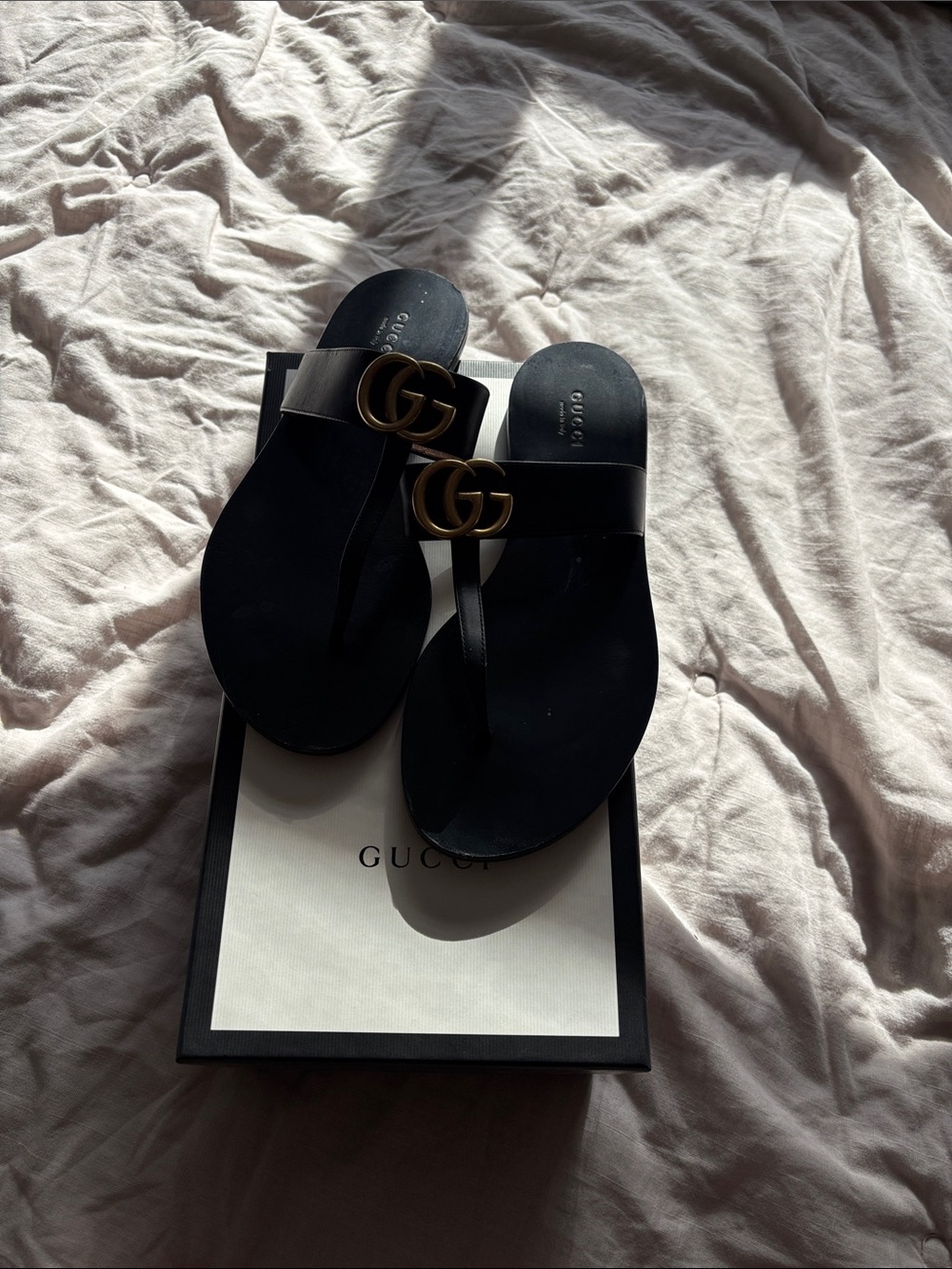 Gucci Black Leather GG Thong Sandals with Gold Logo